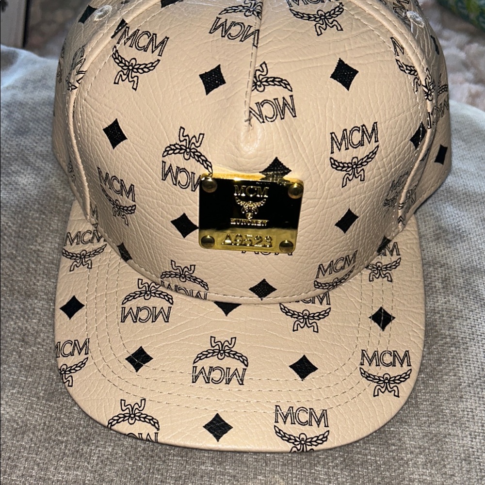 MCM Beige Monogram Leather Cap with Gold Plaque